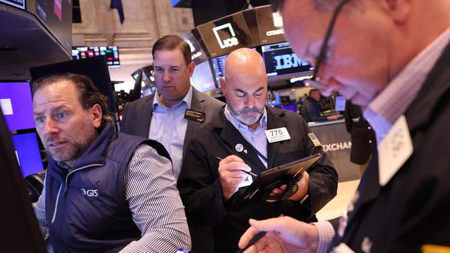 JPMorgan has turned more constructive on US stocks, neutralising its long defensive and short cyclicals call. Picture: AFP