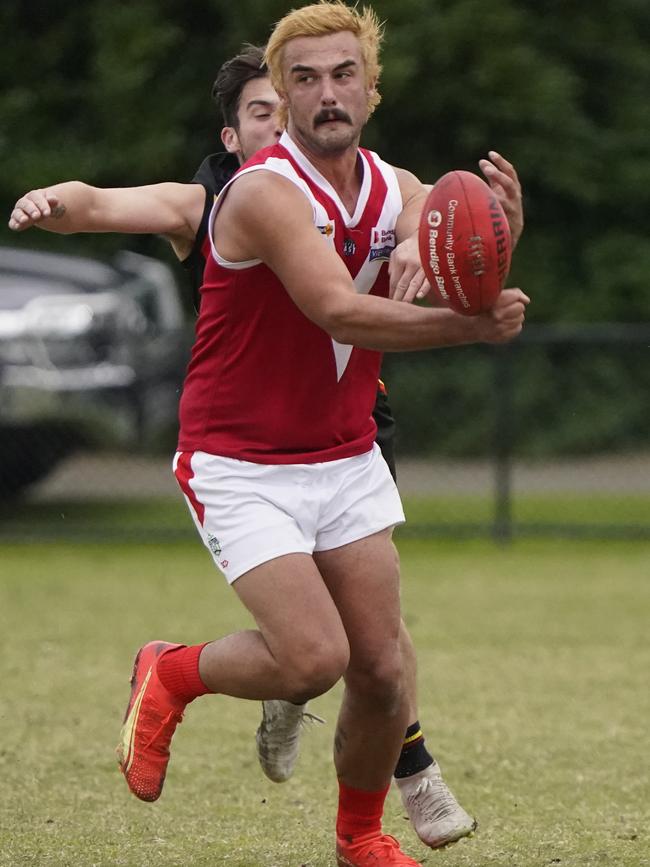 Outer East: Tyson Sund in action for Healesville. Picture: Valeriu Campan