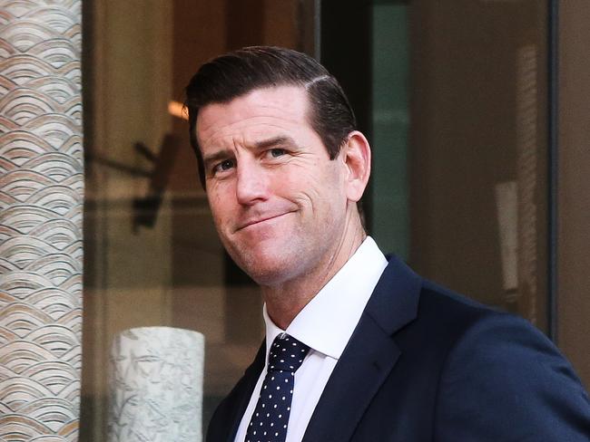 SYDNEY, AUSTRALIA - NewsWire Photos -MARCH 15 2022: Ben Roberts-Smith leaves the Federal Court in Sydney. Mr Roberts-Smith is suing three former Fairfax newspapers over articles he says defamed him in suggesting he committed war crimes in Afghanistan between 2009 and 2012. Picture NCA Newswire/ Gaye Gerard