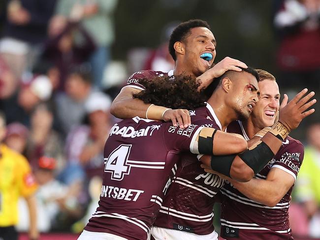 MUDGEE, AUSTRALIA - APRIL 02:  Haumole Olakau'atu of the Sea Eagles celebrates with his team mates Jason Saab, Daly Cherry-Evans and Morgan Harper of the Sea Eagles after scoring a try during the round four NRL match between the Manly Sea Eagles and the Canberra Raiders at Glen Willow Sporting Complex, on April 02, 2022, in Mudgee, Australia. (Photo by Mark Kolbe/Getty Images)