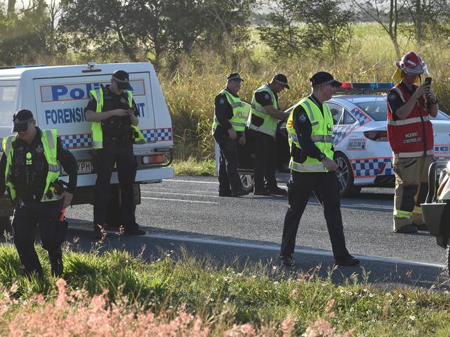 Tragic scenes at a fatal crash on the Bruce Highway near Pindi Pindi. Picture: Lillian Watkins