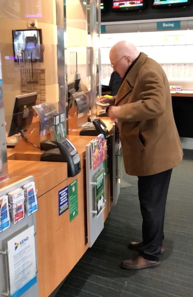 Entertainer Bert Newton was snapped counting his losses at a TAB in Melbourne this week. Picture: Diimex