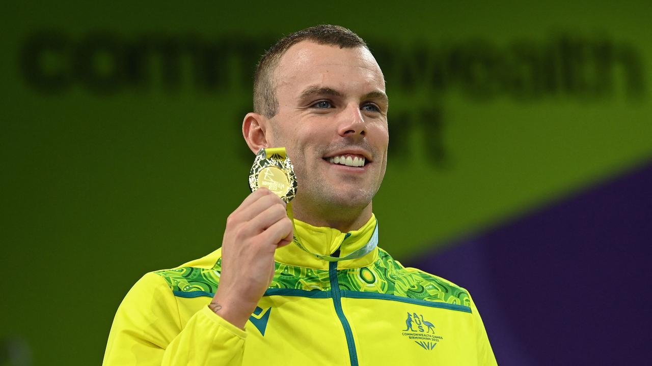 Australia's Kyle Chalmers poses with his gold medal in Birmingham. Photo: AFP