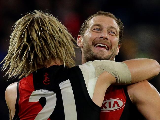 PERTH, WESTERN AUSTRALIA - JUNE 21:  Dyson Heppell and Tom Bellchambers of the Bombers celebrate after defeating the Eagles during the round 14 AFL match between the West Coast Eagles and the Essendon Bombers at Optus Stadium on June 21, 2018 in Perth, Australia.  (Photo by Will Russell/AFL Media/Getty Images)