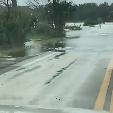 Pickup Drives Through Deep Water in Ormond Beach as Coastal Floods Hit ...