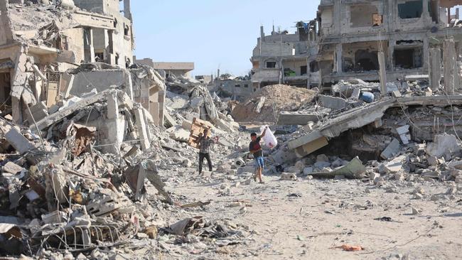 The leaders of Australia, Canada and New Zealand are calling for a ceasefire in Gaza. (Photo by Omar AL-QATTAA / AFP)