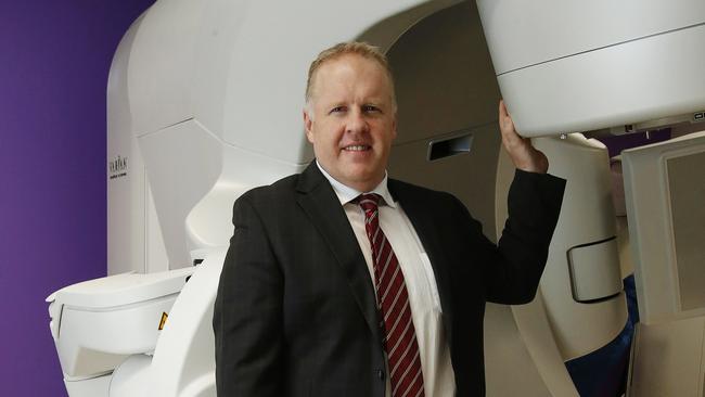 Icon Group CEO Mark Middleton with a Novalis Truebeam linear accelerator used for radiosurgery. Picture: Alan Barber