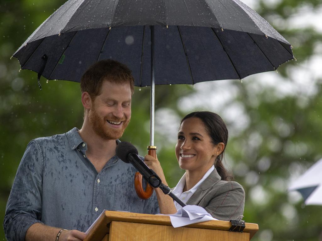 Everyone is swooning of Meghan’s loving look at Harry as he gives his speech at a community picnic at Victoria Park in Dubbo. Picture: Ian Vogler/AP