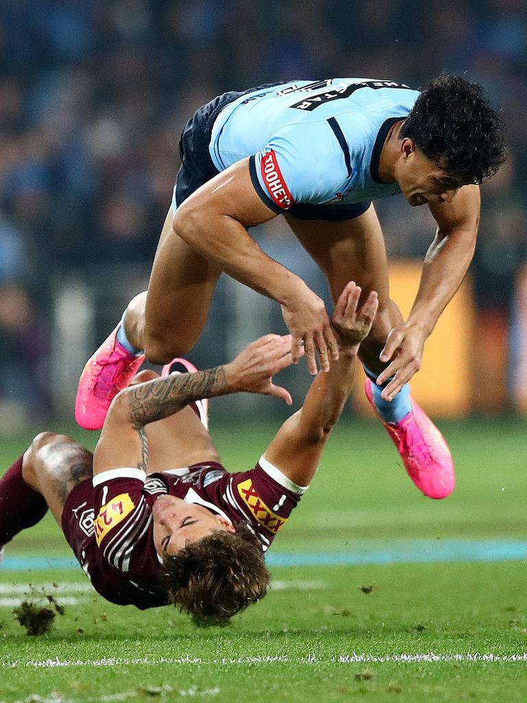 Joseph Sua'ali'i wipes out Reece Walsh. Picture: NRL Photos / Brett Costello