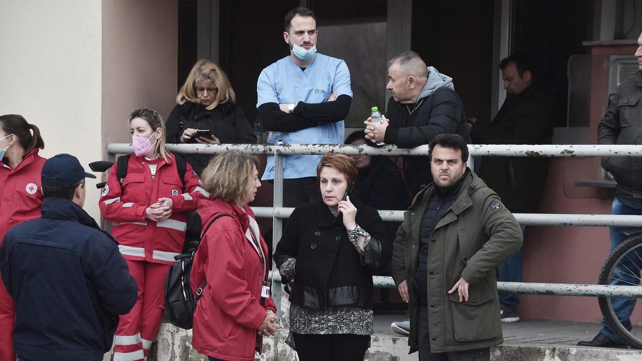 Family members wait for news outside the General Hospital of Larissa following the deadly train accident. Picture: AFP