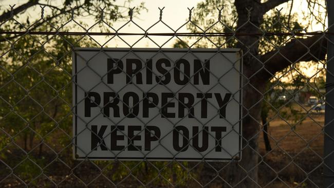 Prison signs hang from the fence around Don Dale Youth Detention Centre. Picture: (A)manda Parkinson