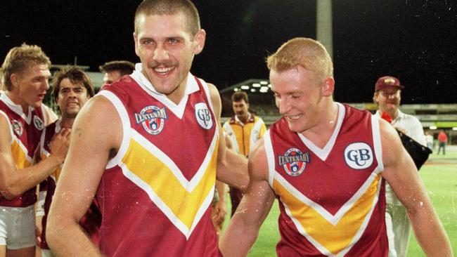 A young Michael Voss (right) enjoys a Brisbane Bears win with Darryl White.