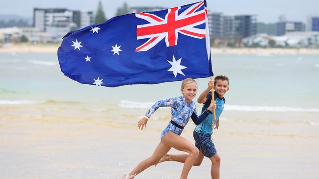 Savannah Turner, 10, from Miami, and Mack Foster, 10, from Currumbin, enjoy some Australia Day fun at Currumbin Alley. Picture: Adam Head