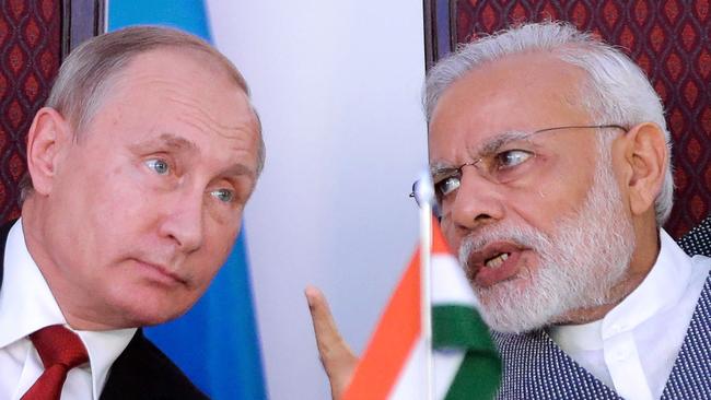 Russian President Vladimir Putin, left, and Indian Prime Minister Narendra Modi. Picture: AFP/SputnikMikhail Metzel