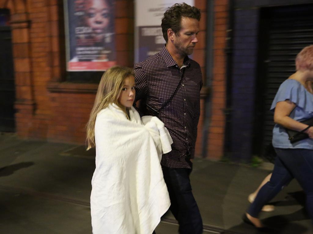 Police escort members of the public from the Manchester Arena on May 23, 2017 in Manchester, England. Picture: Getty