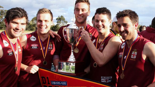 Prince Alfred Old Collegians celebrate after their Division 1 grand final win.