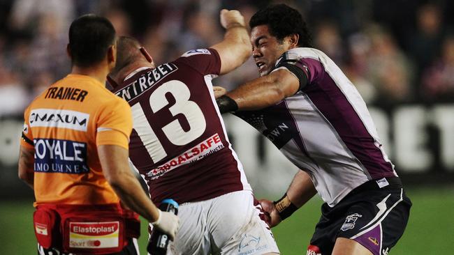 Glenn Stewart and Adam Blair continue the infamous Battle of Brookvale fight after being sin-binned. Picture: Brett Costello