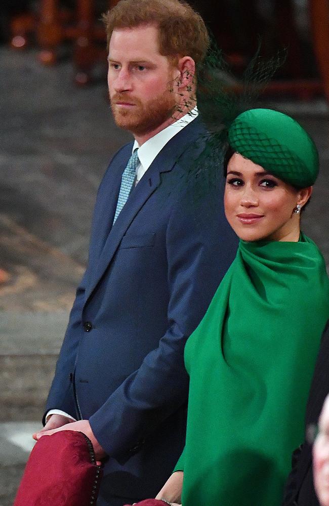 ‘A firing squad’. Tensions were obvious during Harry and Meghan’s finale royal engagement in March. Picture: AFP