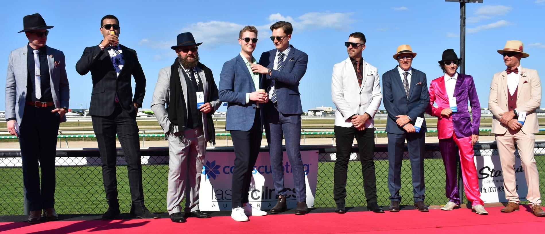 The men line up for the Stallion of the Day.