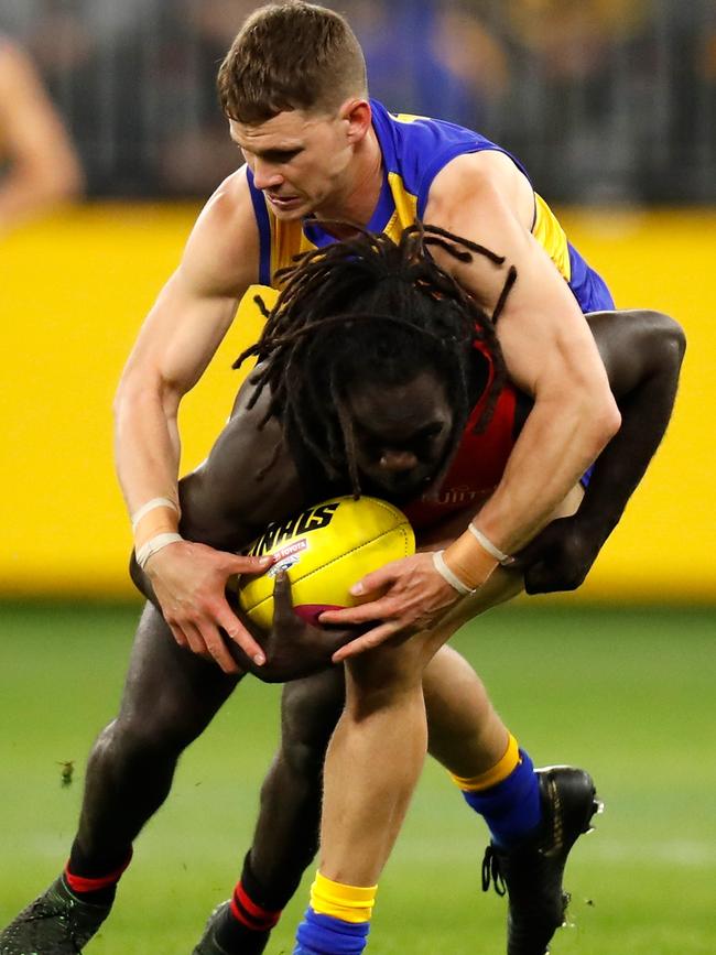 Anthony McDonald-Tipungwuti is tackled by Jack Redden. Picture: AFL Photos