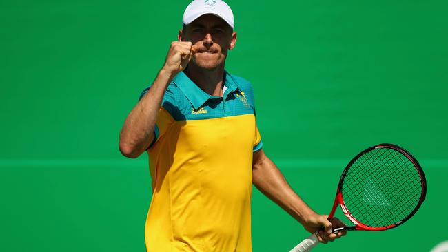 RIO DE JANEIRO, BRAZIL — AUGUST 06: John Millman of Australia celebrates a point against Ricardas Berankis of Lithuania in their first round match on Day 1 of the Rio 2016 Olympic Games at the Olympic Tennis Centre on August 6, 2016 in Rio de Janeiro, Brazil. (Photo by Clive Brunskill/Getty Images)