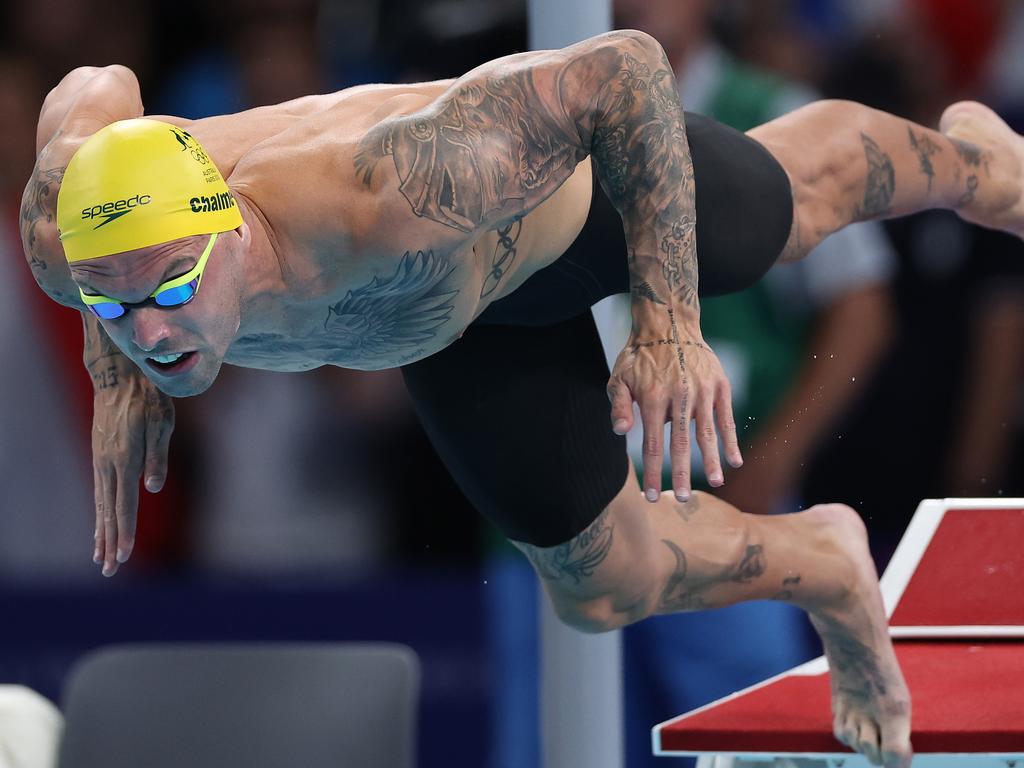 Chalmers tries to bring some personality to swimming with tattoos, earrings and wild haircuts. Picture: Quinn Rooney/Getty Images