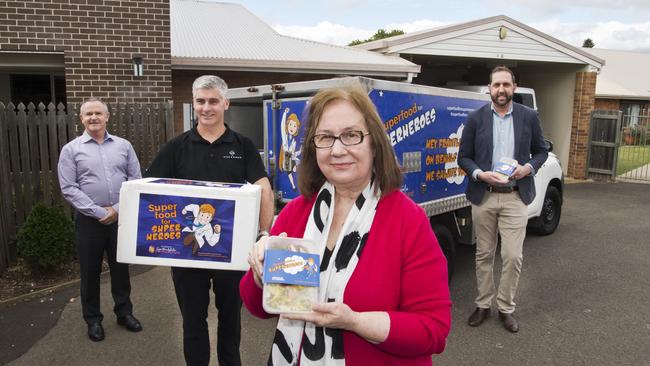 Brodribb staff receive donated meals. ( From left ) Noel Shepheard, David Barber, Pam Chipperfield ( CEO Brodribb ) and Steve Collier ( MOA ). Thursday, 7th May, 2020.