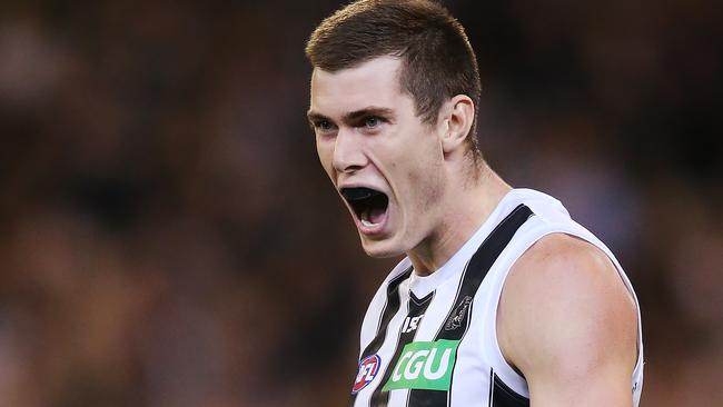 Mason Cox celebrates a goal during Collingwood’s win over Richmond. Picture: Michael Dodge/Getty Images.