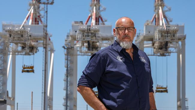 MUA assistant national secretary Adrian Evans outside DP World terminal at Fremantle.