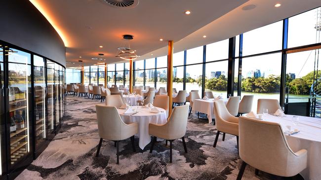 The elegant upstairs dining room enjoys stunning views over Albert Park lake.