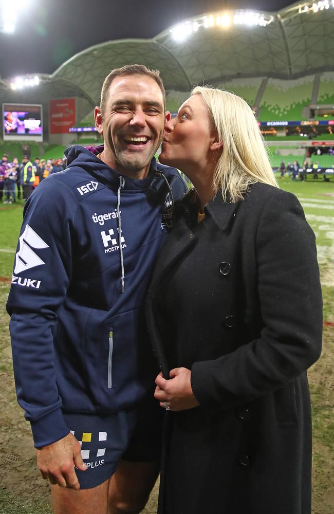 Melbourne Storm captain Cameron Smith is kissed by his wife Barbara Smith at AAMI Park. Picture: Scott Barbour/Getty Images