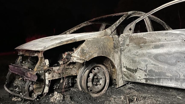 Fire crews were called to this stolen car fire along Greg Jabs Drive about 5am on Tuesday, July 18. Picture: Natasha Emeck
