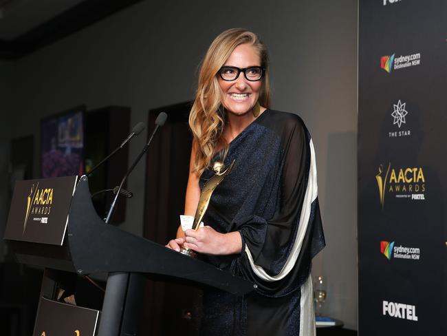 Eva Orner poses after winning the AACTA Award for Best Feature Length Documentary. Picture: Caroline McCredie/Getty