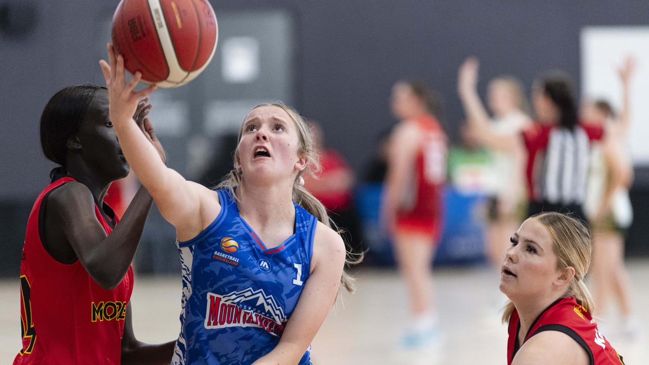 Millie Natalier (centre) of Toowoomba Mountaineers under pressure from Ayen Akech (left) and Jordyn Beasley of Moreton Bay Suns in SQJBC U18 Women round 3 basketball at Toowoomba Grammar School, Sunday, October 20, 2024. Picture: Kevin Farmer