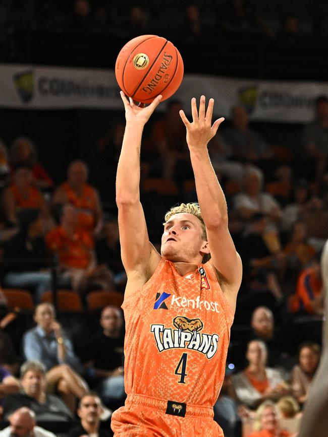 CAIRNS, AUSTRALIA - SEPTEMBER 28: Kyle Adnam of the Taipans shoots during the round two NBL match between Cairns Taipans and Adelaide 36ers at Cairns Convention Centre, on September 28, 2024, in Cairns, Australia. (Photo by Emily Barker/Getty Images)