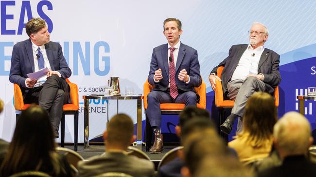 The Australian’s Cameron Stewart hosts a panel on the ‘new global disorder’ with Senator Simon Birmingham and Professor Gareth Evans at the Economic and Social Outlook Conference in Melbourne. Picture: Aaron Francis