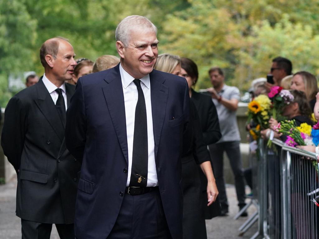 Prince Andrew, Duke of York and Prince Edward, Earl of Wessex, smile at the members of the public after attending a service at Crathie Kirk church near Balmoral following the death of Queen Elizabeth II. Picture: Owen Humphreys-WPA Pool/Getty Images