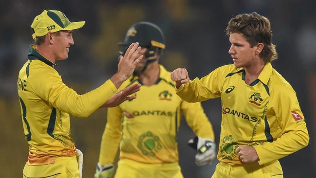 Adam Zampa (R) finished with four wickets to be the pick of the Australian bowlers. Picture: AFP