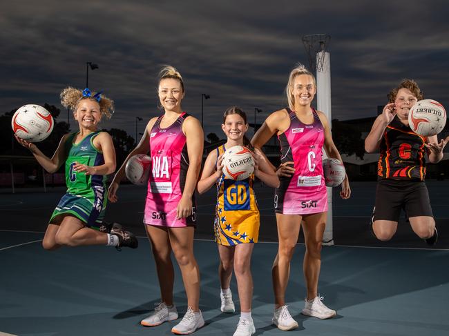 Players from the Hills (left), Southern Hills and Adelaide Plains Netball Associations with Thunderbirds players Georgie Horjus and Tayla Williams. Picture: Sarah Reed Photography / Corporate Conversations