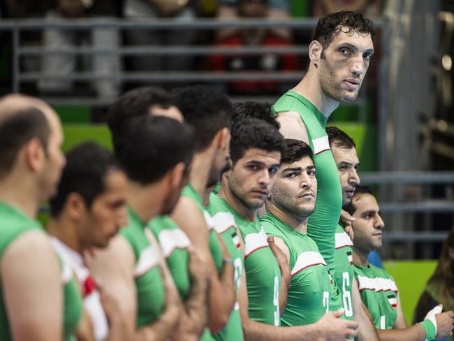 ONE TIME WEB USE ONLY - Morteza Mehrzad (2) of IranÕs Paralympics sitting volleyball team, who measures just above eight feet, center, during a match against China at the Paralympics in Rio de Janeiro, Sept. 10, 2016. With MehrzadÕs entrance into the competition, the coaches of other nations must rethink their strategy, or get taller players. © New York Times/Headpress Picture: Lianne Milton for The New York Times / Headpress