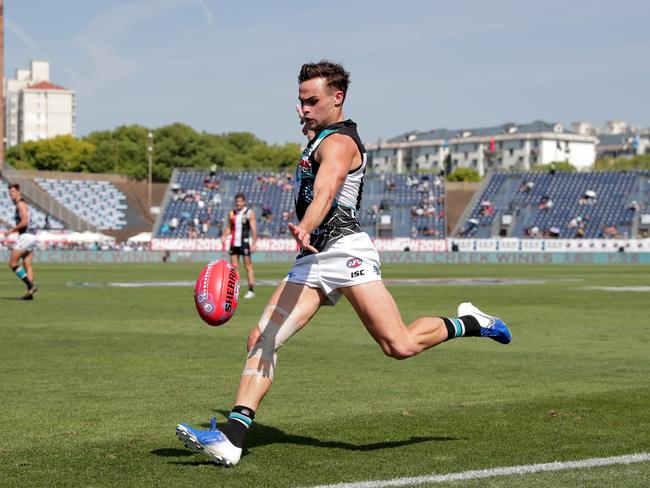 SHANGHAI, CHINA - JUNE 02: Karl Amon of the Power kicks the ball during the 2019 AFL round 11 match between the St Kilda Saints and the Port Adelaide Power at Jiangwan Stadium on June 02, 2019 in Shanghai, China. (Photo by Michael Willson/AFL Photos)