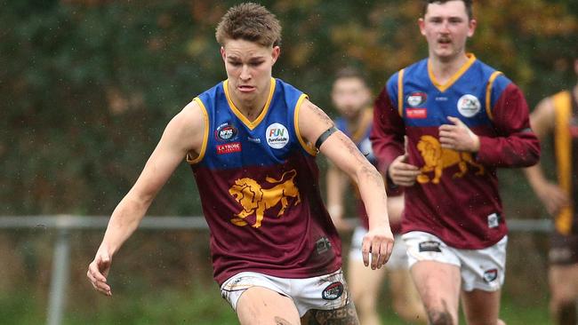 Kain Hall chases the ball down for South Morang. Picture: Hamish Blair