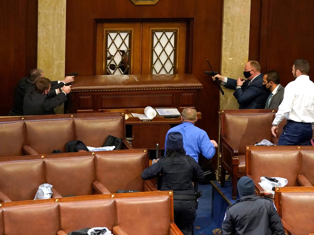 Guns drawn in the House. Picture: AFP