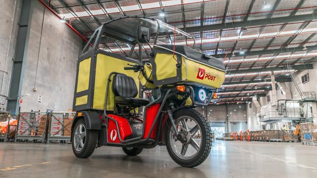 An electric three-wheel postie vehicle similar to the one allegedly stolen during a Bar Beach street robbery.