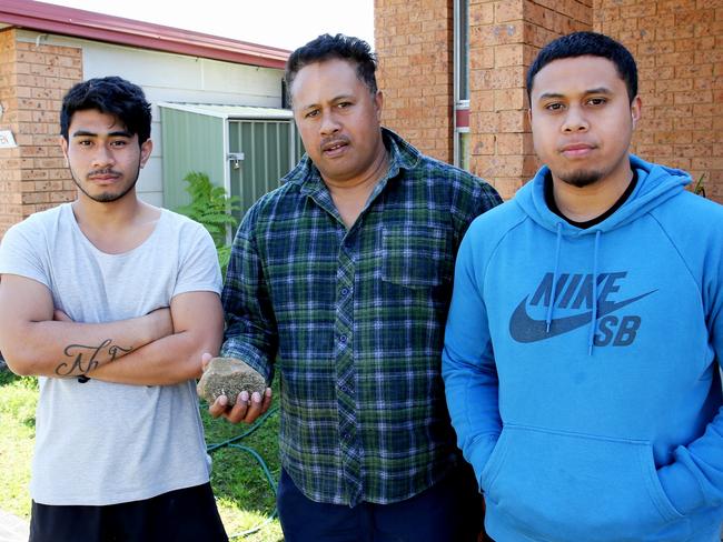 Mr Ah Chong, centre, with Allice Ah Fa, left, and son Derek, right.