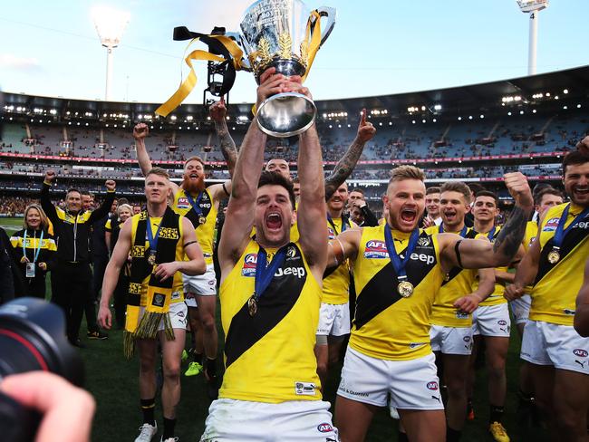 Trent Cotchin wouldn’t have been able to lift the premiership cup in 2017 without the intervention of MRP member Nathan Burke. Picture: Phil Hillyard