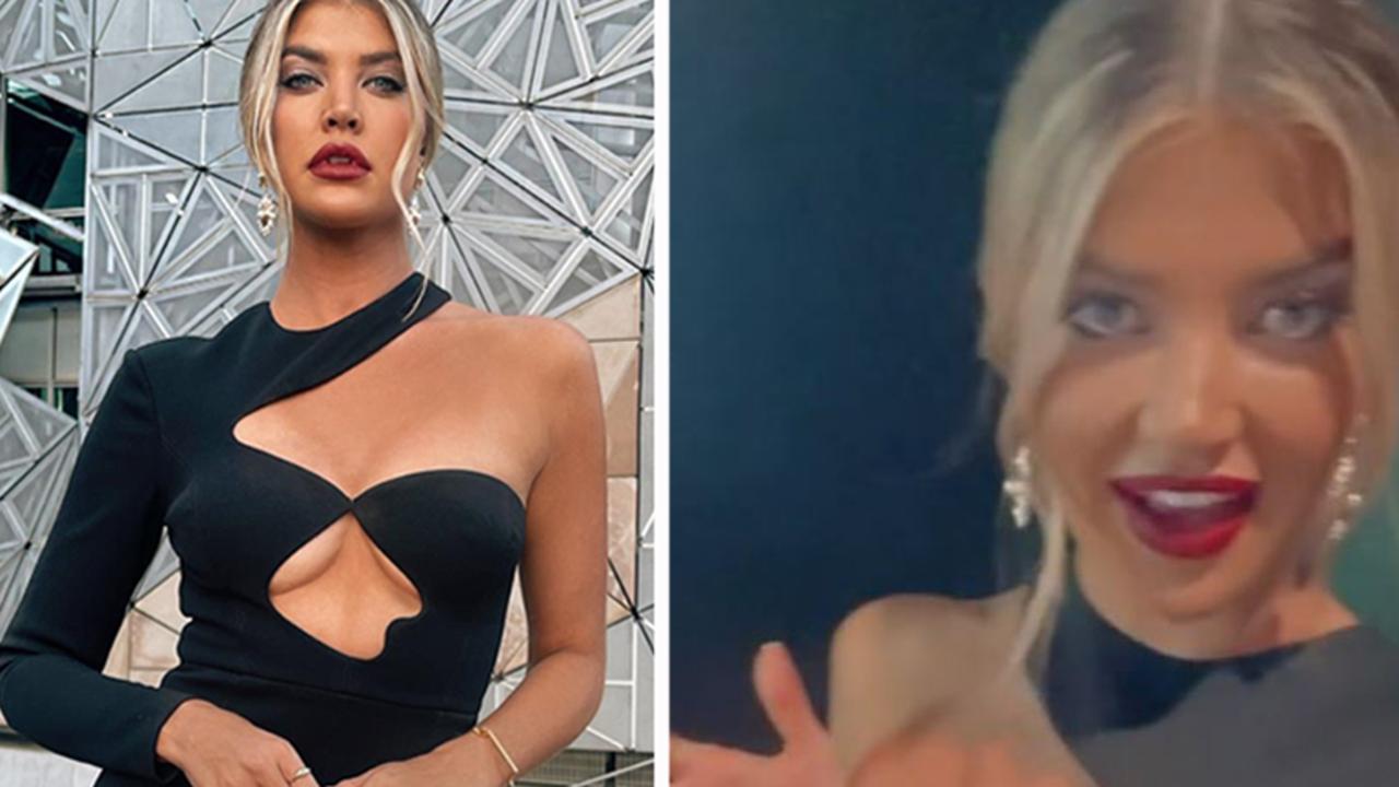 Anna McEvoy's 'boobs pop out' of daring dress at Melbourne Fashion