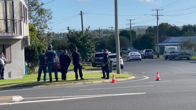 Heavily armed police at the scene of a 10-hour stand off on the streets of Warwick on March 14, 2023. Photo: Michael Hudson.