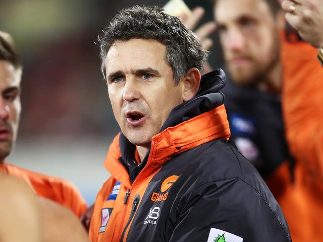 CANBERRA, AUSTRALIAN CAPITAL TERRITORY - AUGUST 11:  Giants coach Leon Cameron speaks to players at three quarter time during the round 21 AFL match between the Greater Western Sydney Giants and the Adelaide Crows at UNSW Canberra Oval on August 11, 2018 in Canberra, Australia.  (Photo by Matt King/AFL Media/Getty Images)