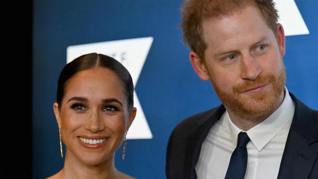 (FILES) Prince Harry, Duke of Sussex, and Meghan, Duchess of Sussex, arrive at the 2022 Robert F. Kennedy Human Rights Ripple of Hope Award Gala at the Hilton Midtown in New York City on December 6, 2022. Prince Harry and wife Meghan Markle were involved in a "near catastrophic car chase" involving paparazzi in New York late on May 16, 2023, a spokesperson for the couple said May 17. "This relentless pursuit, lasting over two hours, resulted in multiple near collisions involving other drivers on the road, pedestrians and two NYPD officers," the spokesperson added. (Photo by ANGELA WEISS / AFP)